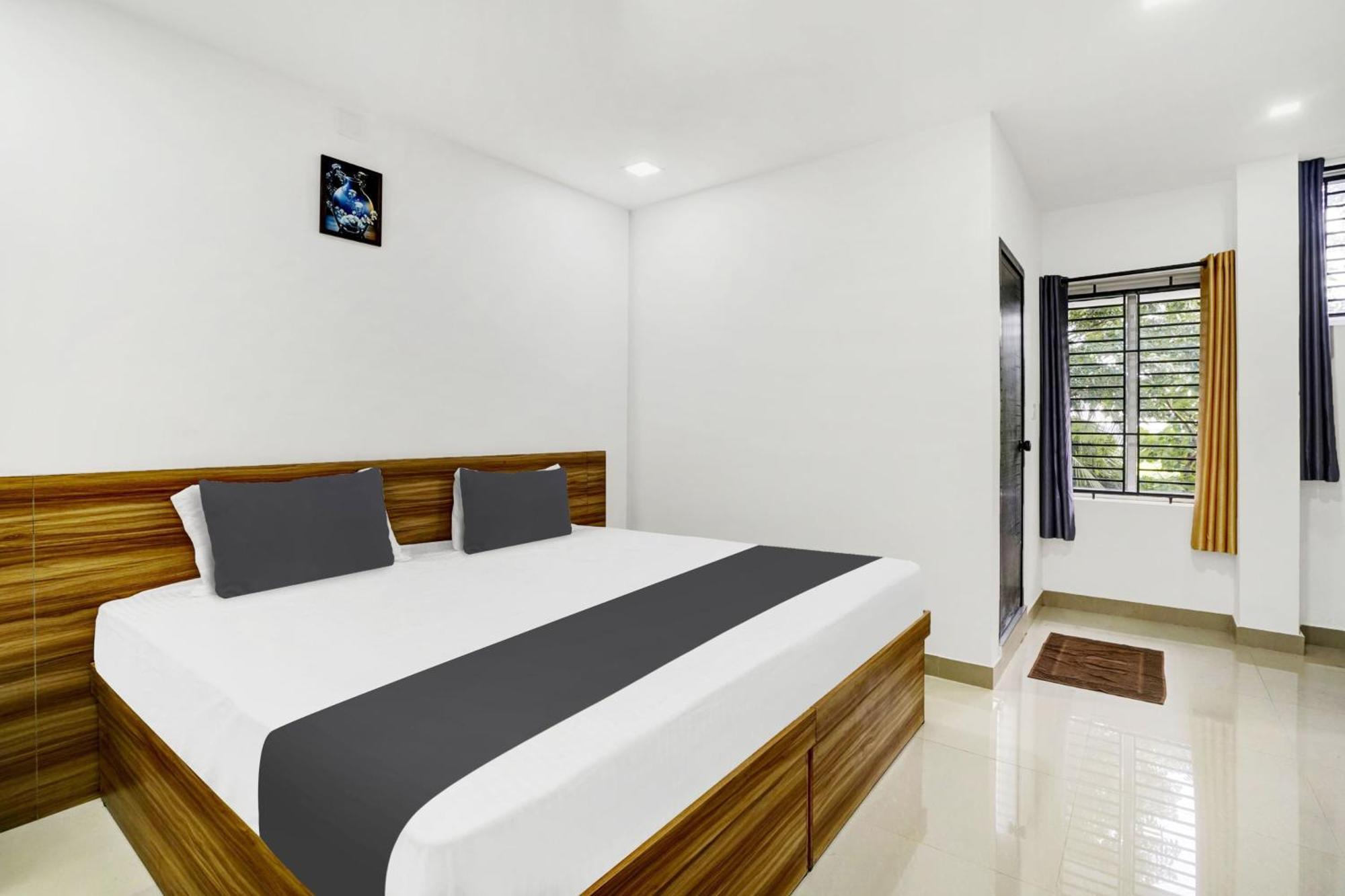 Hotel O Grand Parassini Pāppinisseri Extérieur photo