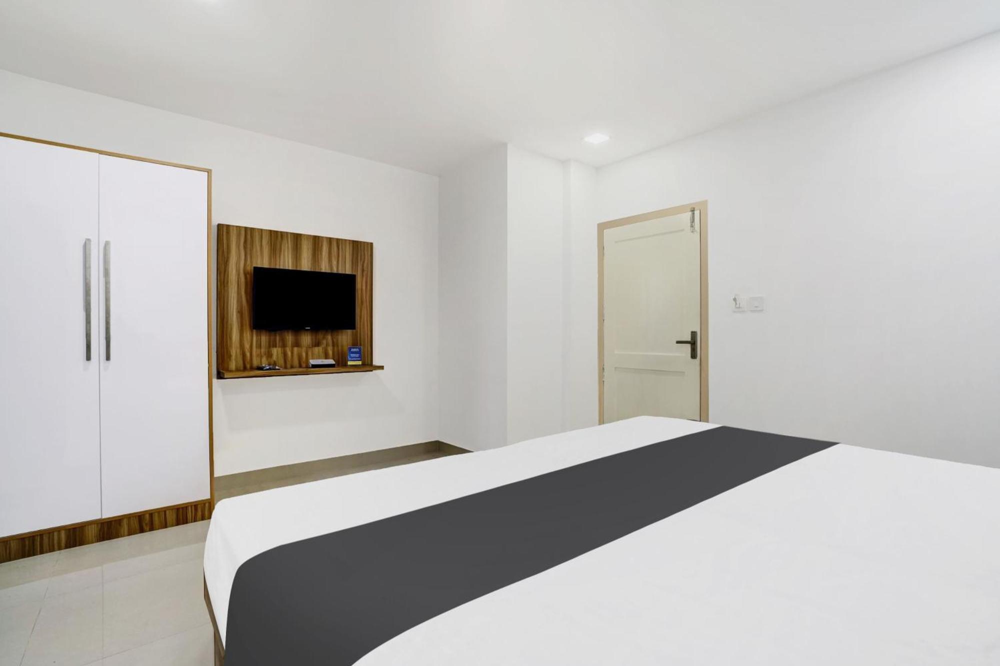 Hotel O Grand Parassini Pāppinisseri Extérieur photo